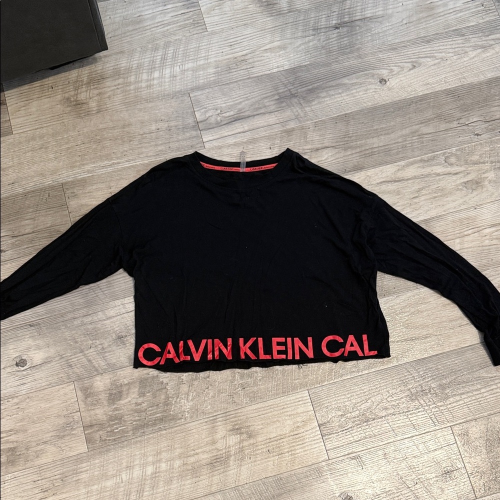 Calvin Klein Black Cropped Long Sleeve Top with Red Logo Hem